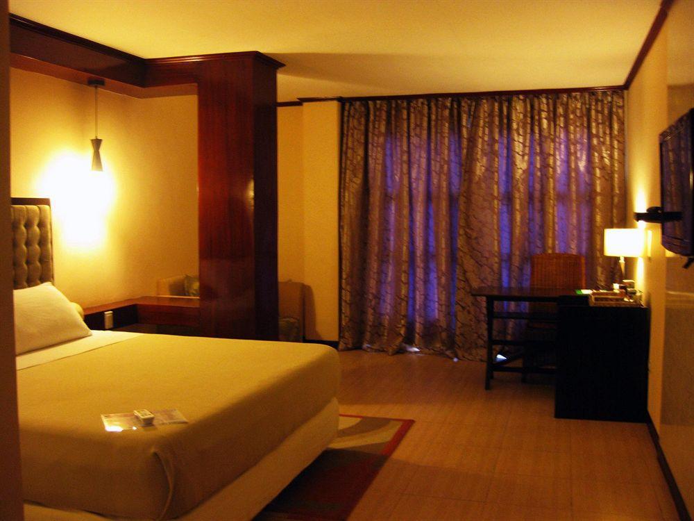 Dulcinea Hotel And Suites Мактан Экстерьер фото