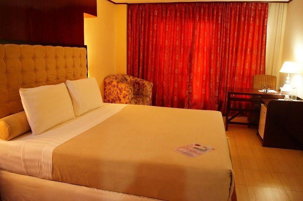 Dulcinea Hotel And Suites Мактан Экстерьер фото